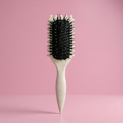 Turquoise detangling hair brush with black bristles, anti-frizz and anti-tangle design for creating defined curls and smooth styling