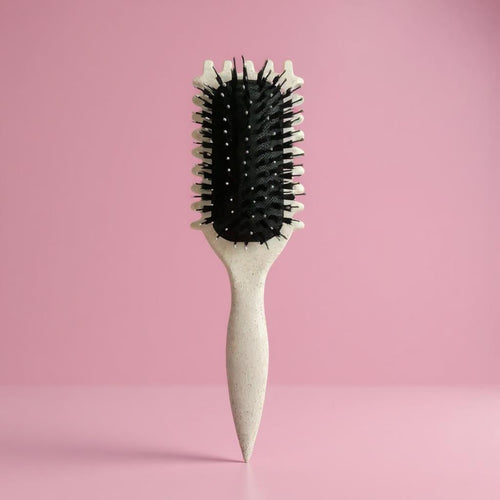 Turquoise detangling hair brush with black bristles, anti-frizz and anti-tangle design for creating defined curls and smooth styling