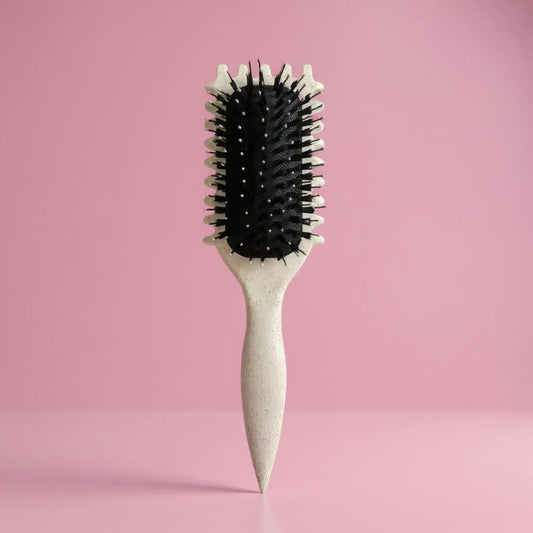 Turquoise detangling hair brush with black bristles, anti-frizz and anti-tangle design for creating defined curls and smooth styling