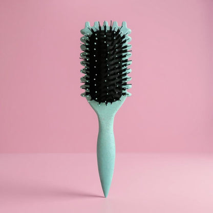 Turquoise detangling hair brush with black bristles, anti-frizz and anti-tangle design for creating defined curls and smooth styling